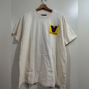 Gallery Men’s Cream Tee with Yellow & Blue Pocket Graphic